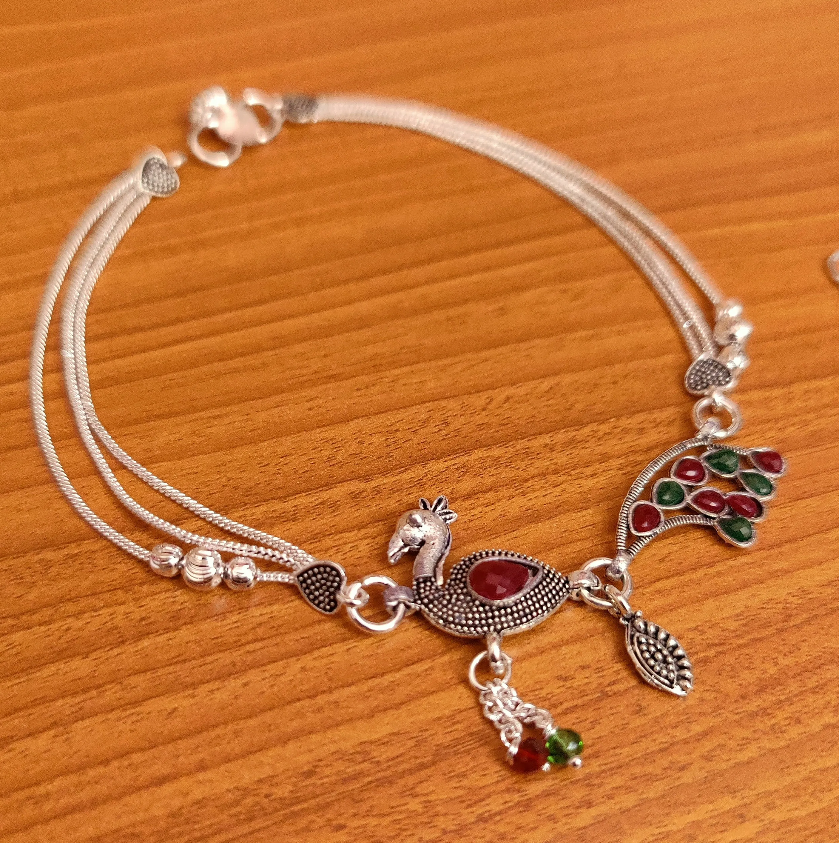 MULTICOLOUR SILVER ANTIQUE LOOK PEACOCK ANKLETS