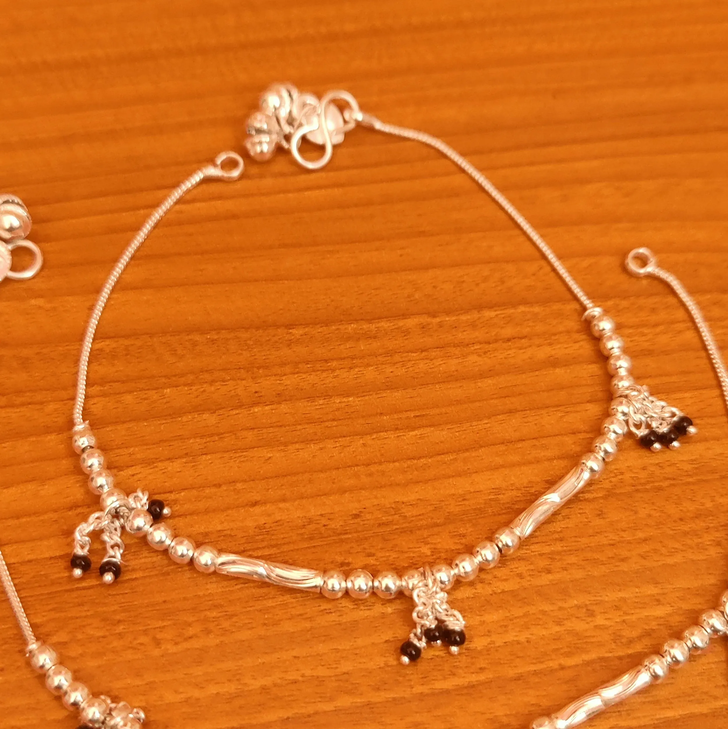 SILVER LOOK ALIKE ANKLETS WITH BLACK BEADS
